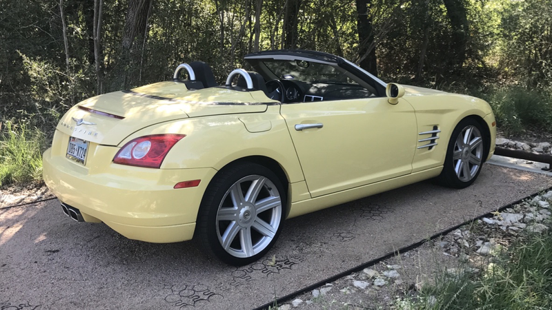 Some hero parked this amazing condition and color Crossfire with the top down in a corner of the lot away from everything else.
